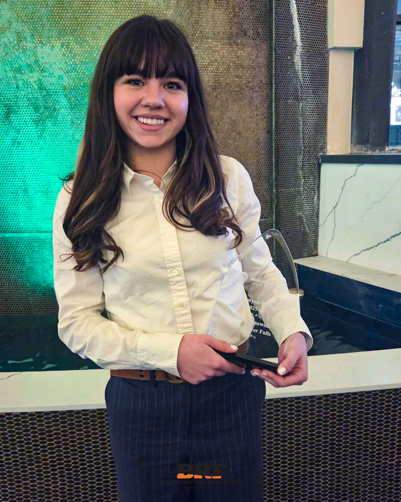 Athlete holding a plaque