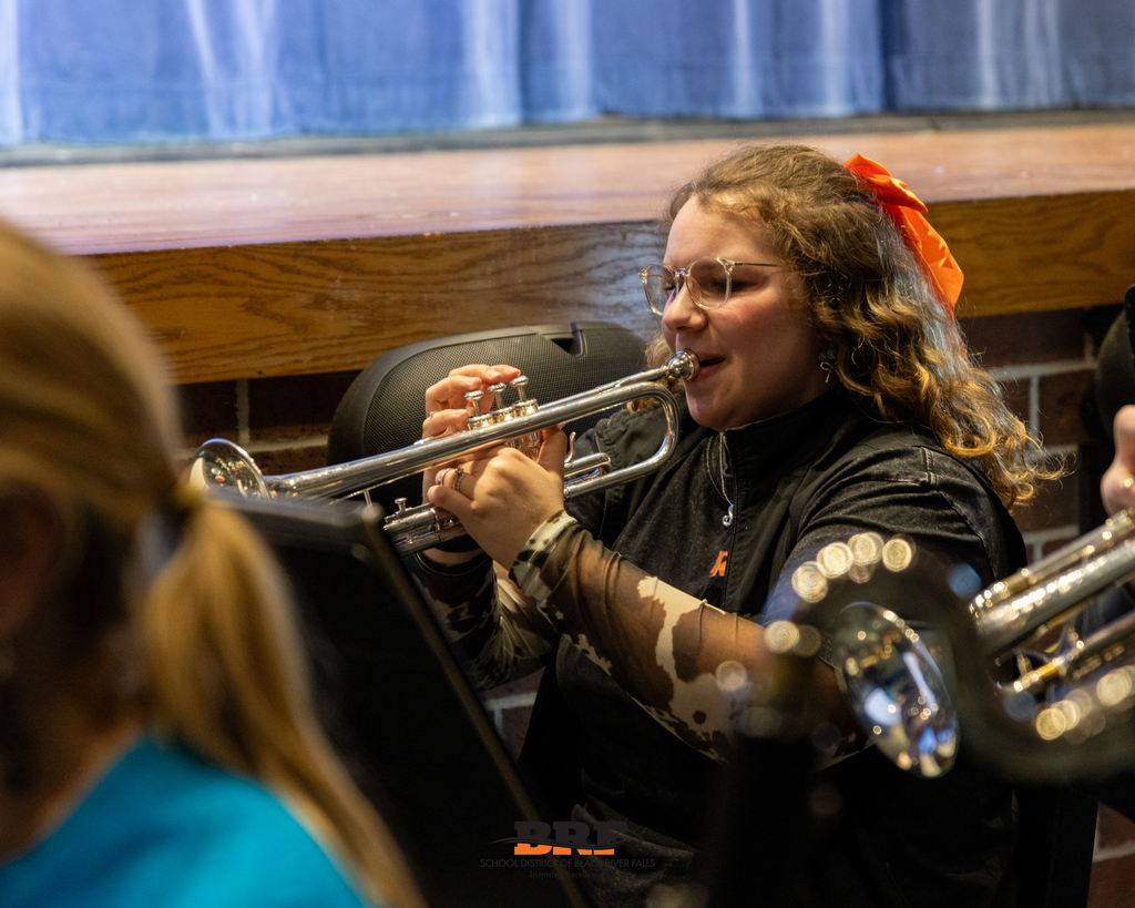 Girl playing trumpet