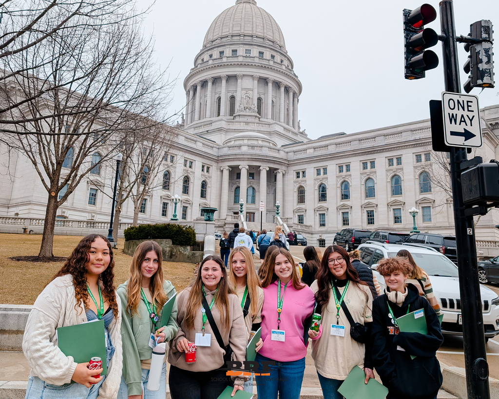 Group of students in front of the Wisconsin State Capitol building.
