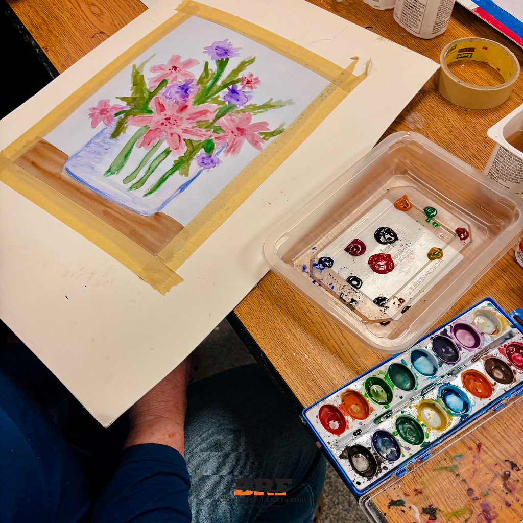 Person painting a watercolor