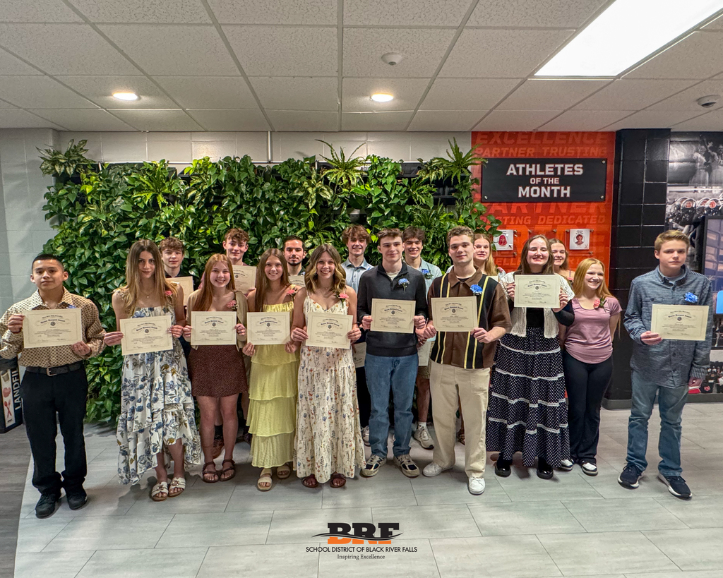 Group of students holding certificates
