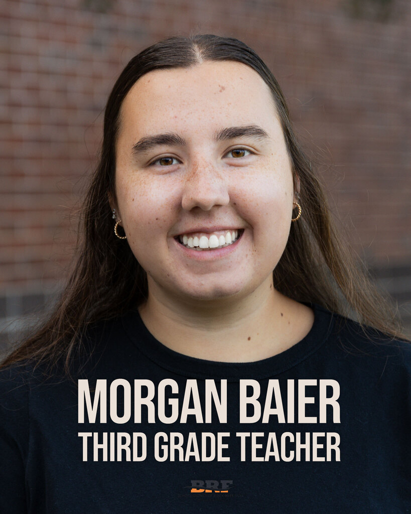 Text on image: Morgan Baier Third Grade Teacher. Photo of woman with dark hair and dark t-shirt.