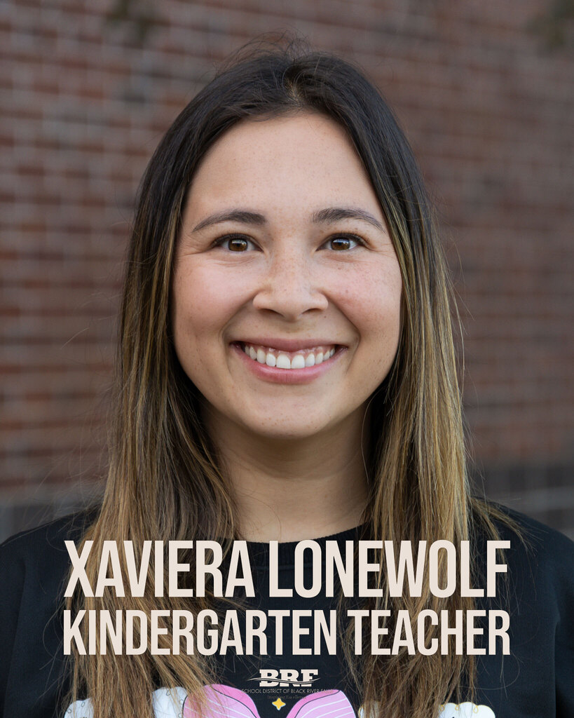 Xaviera Lonewolf, Kindergaten Teacher. Portrait of a smiling woman.