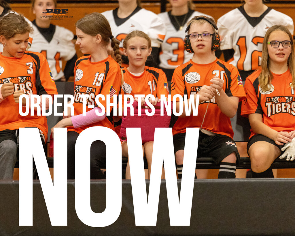 Athletes sitting on sidelines, watching game. Text on image: Order t-shirts now.