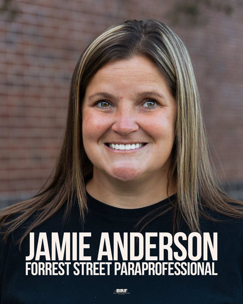 Jamie Anderson, Forrest Street Paraprofessional. Portrait of a woman in a black shirt.