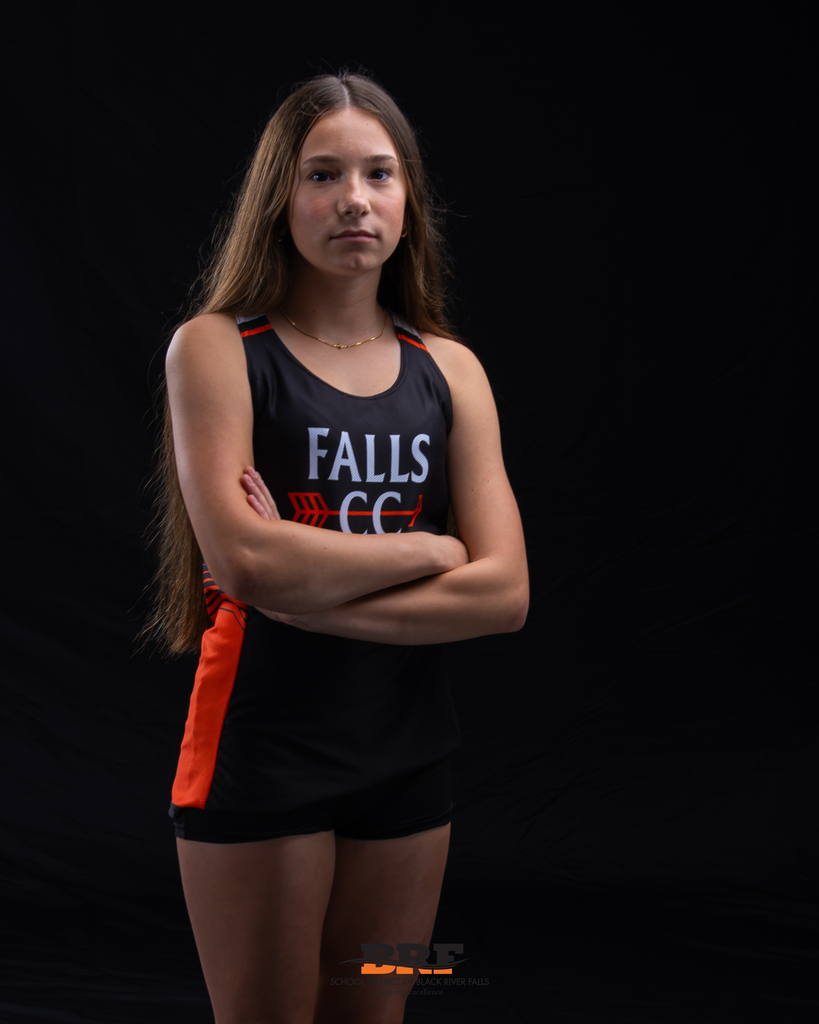 Girl in a Falls CC singlet.