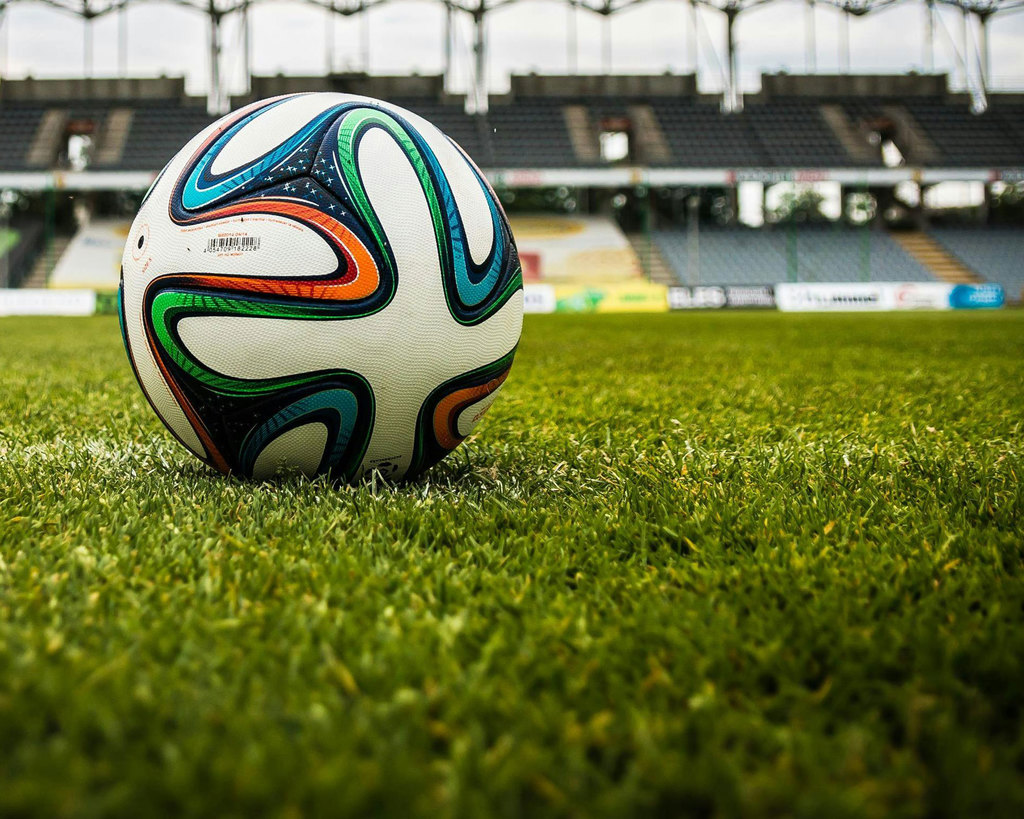 A soccer ball on a field.