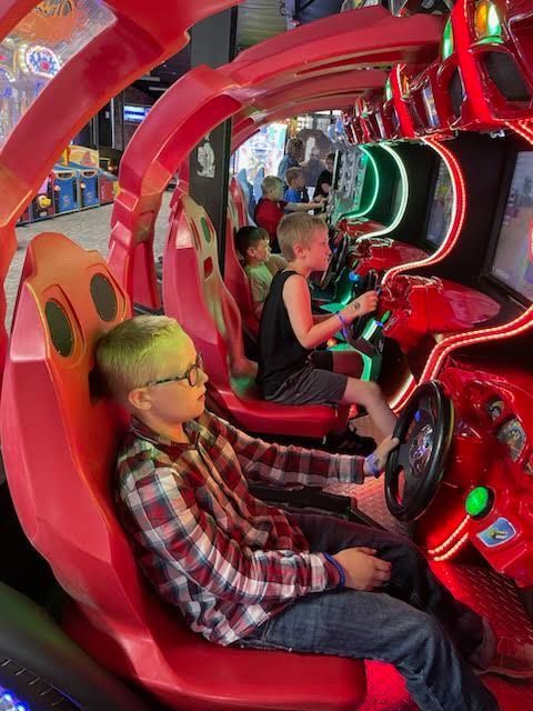 students playing at arcade