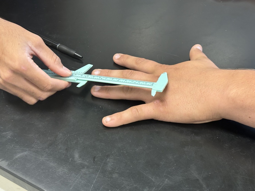 Forensic Science students practicing the Bertillon Measurement System.