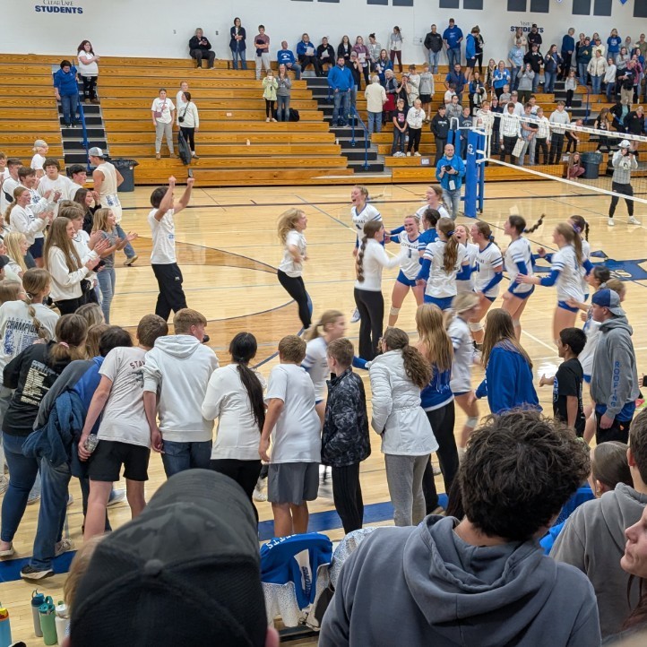 volleyball players celebrating