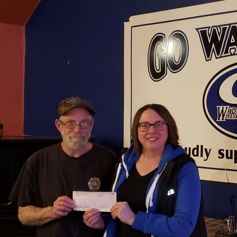 donation check given to Principal 