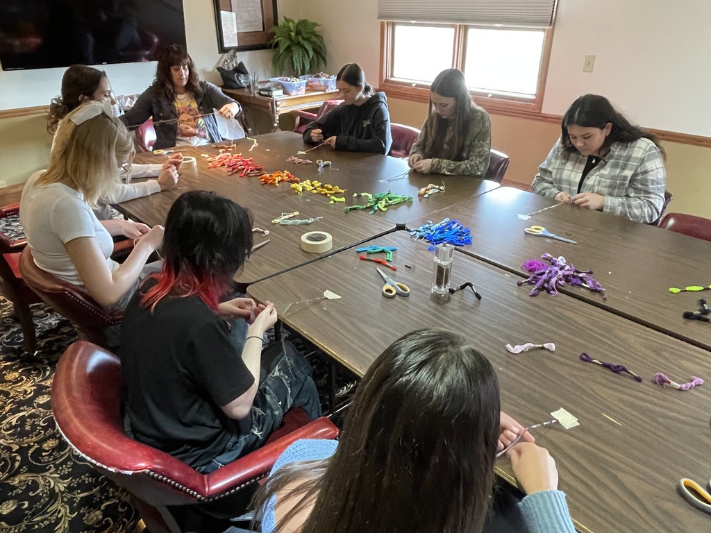 ASA winners making bracelets