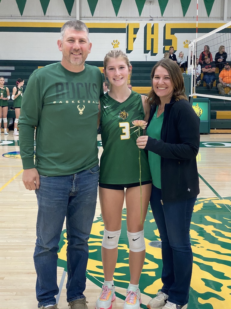 Florence Varsity Volleyball Player and their parents