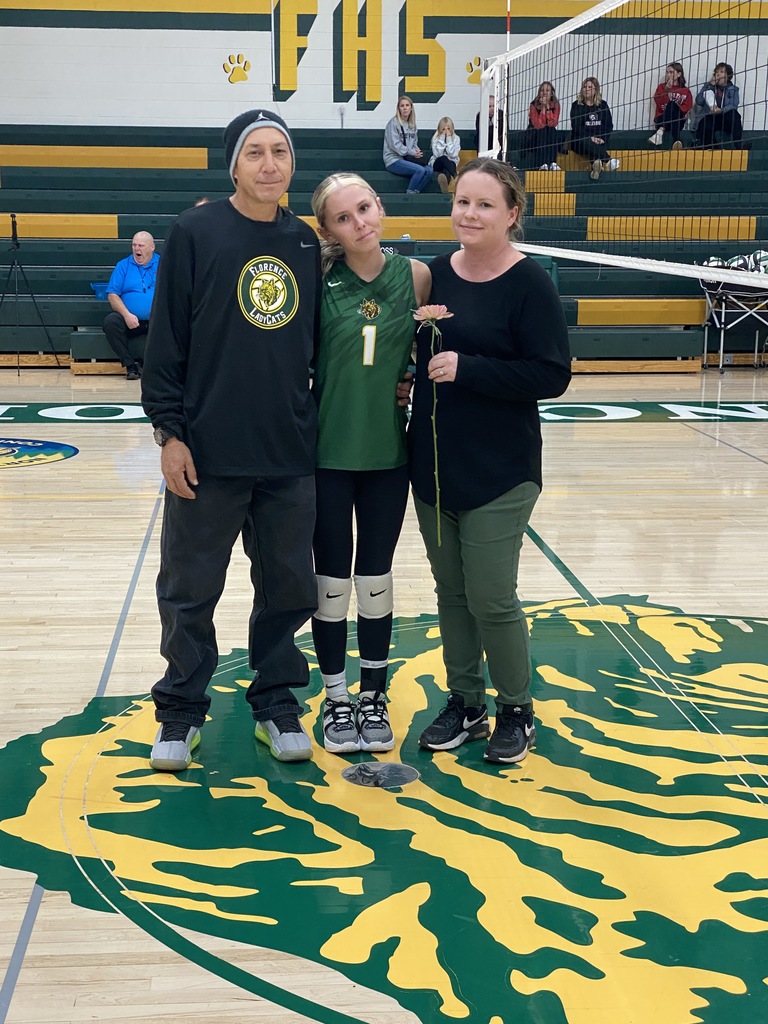 Florence Varsity Volleyball Player and their parents