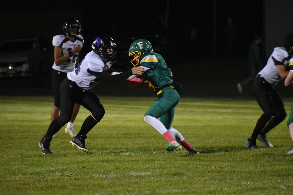 Florence Niagara Football players on the football field