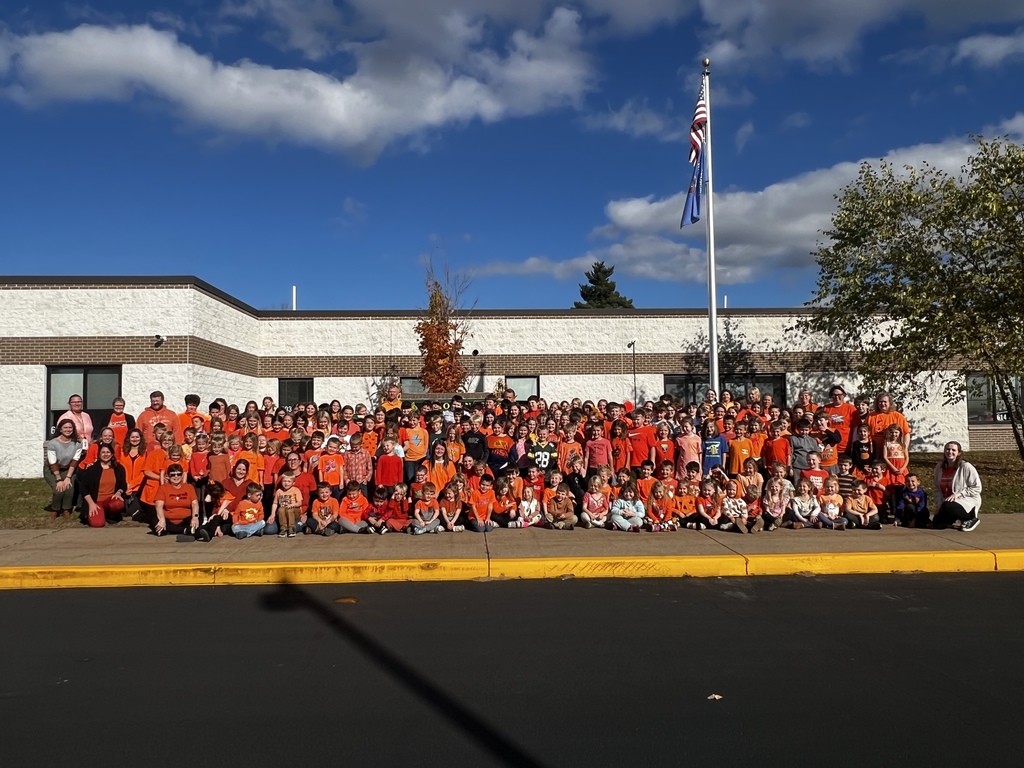 Elementary Students and Staff Dressed in Orange