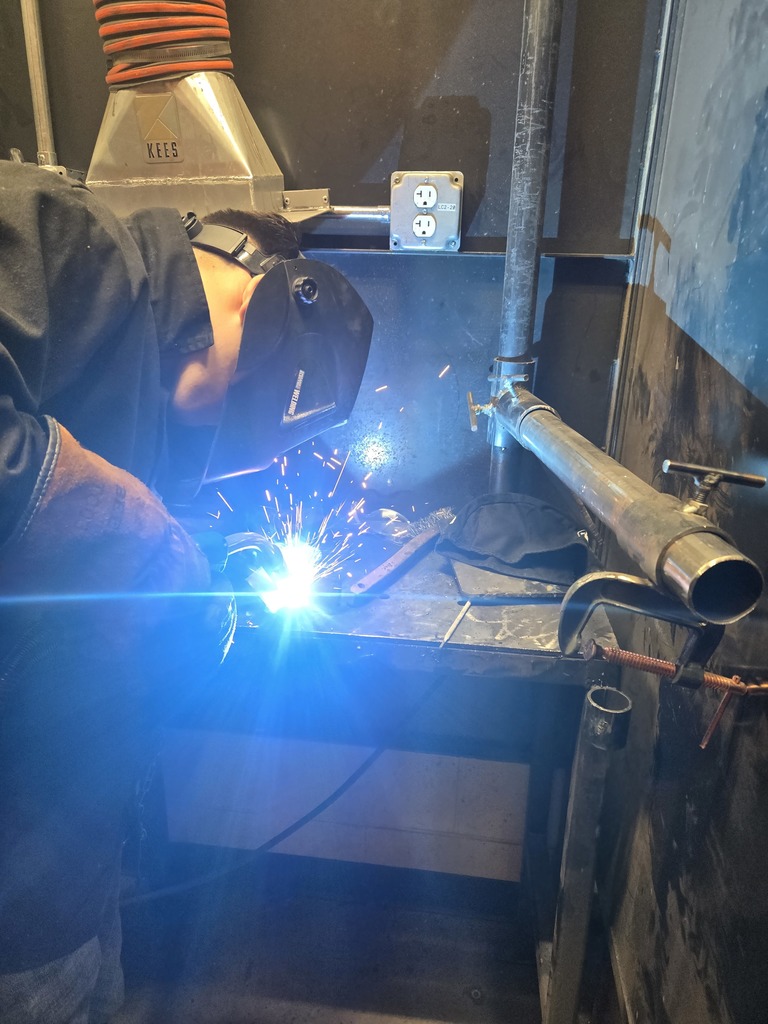 Florence student welding