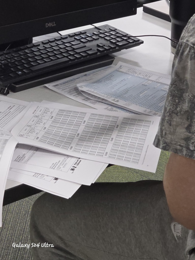 Florence Business Ed Students with tax return forms