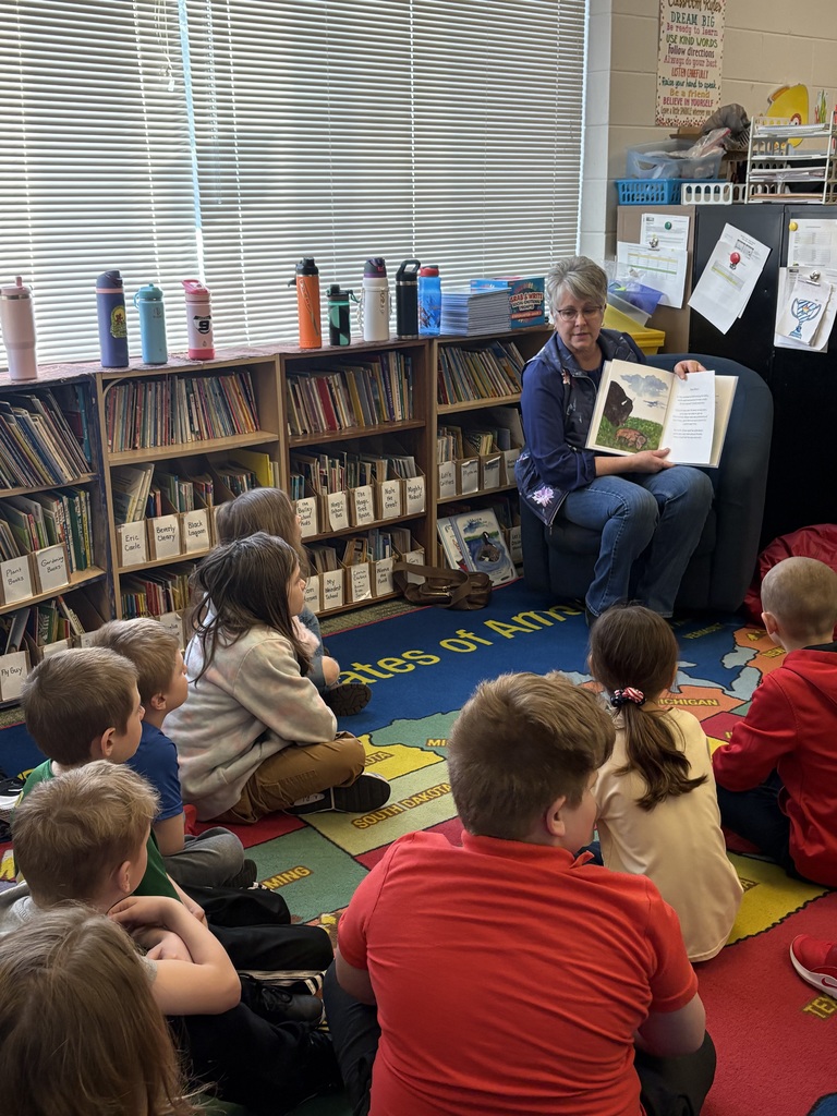 Carol Schultz reading to Florence 2nd grade students