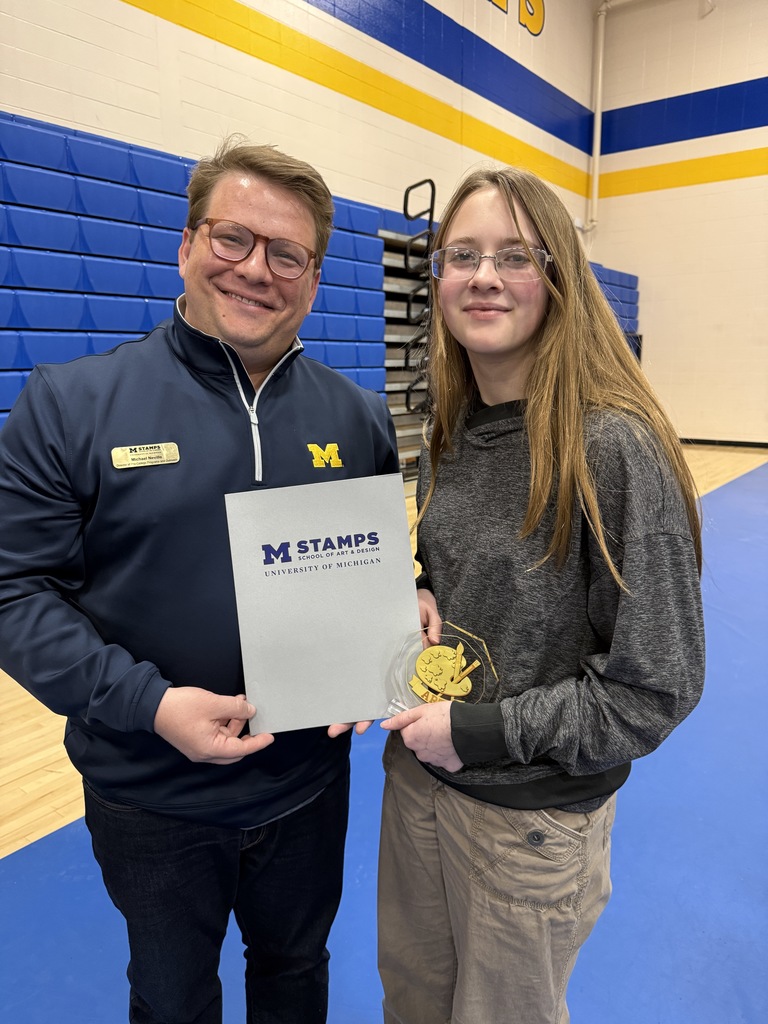 Chloe Zegar with UofM representative