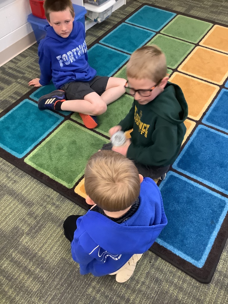 1st grade students making butter