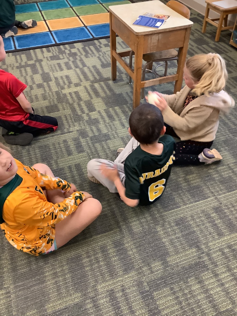 1st grade students making butter