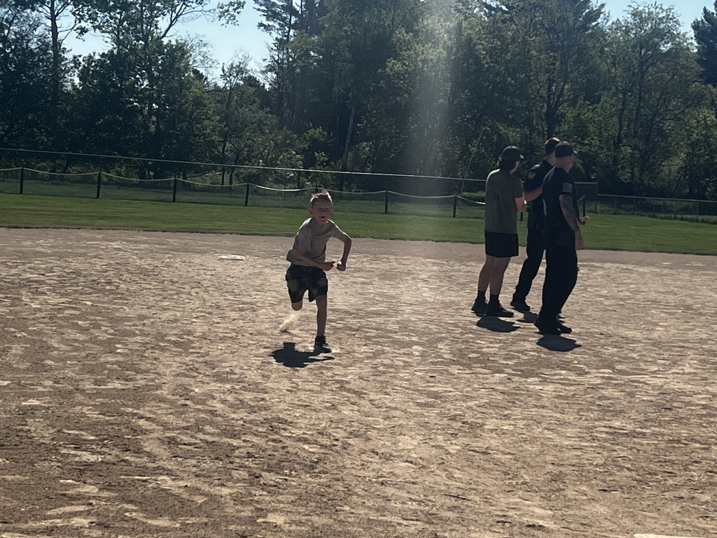 Kick with a cop student running from base with 3 sheriff's men in front of him