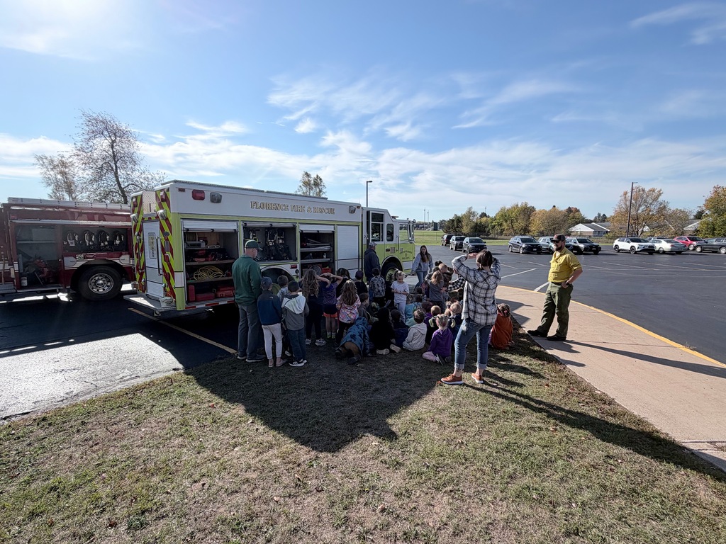 Children learning about fire trucks