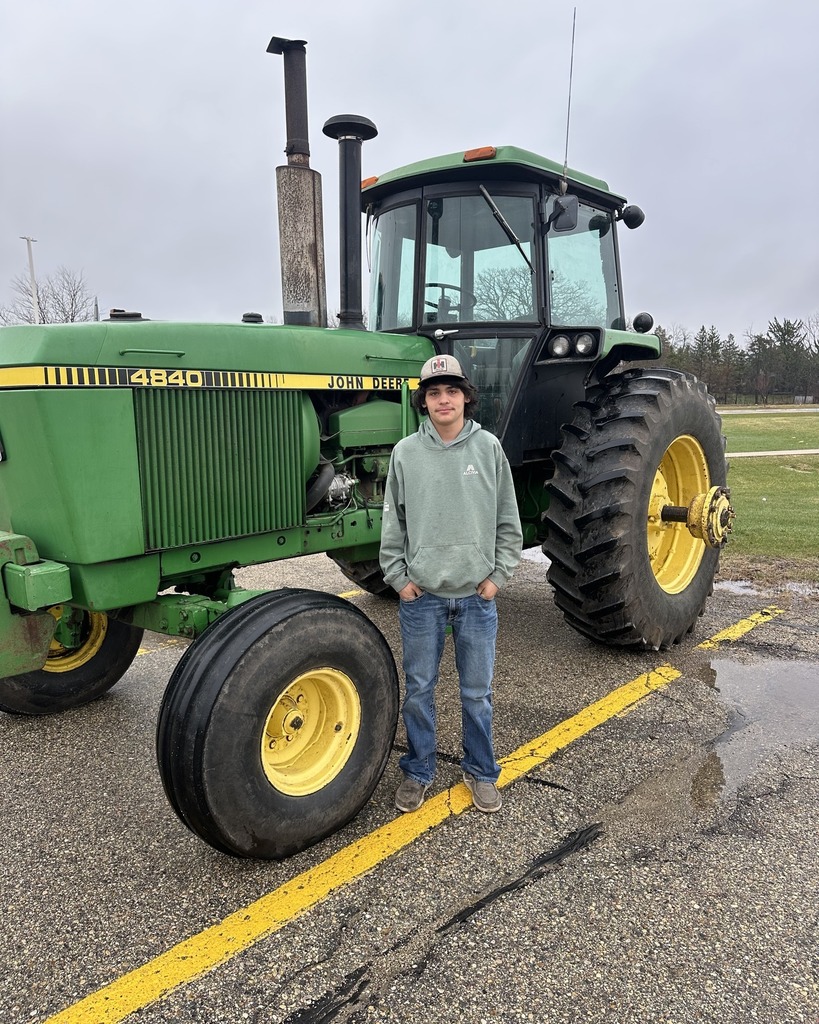  Pictured are Owen Kempf and Keilah Reu showing off their tractors and school spirit. 🌾