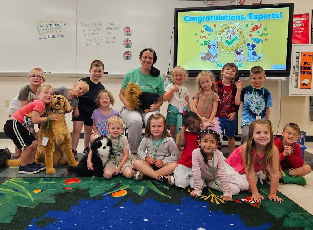 Our Mini-Kindergarten summer school students recently welcomed a special guest to their daily Safety City class! Mrs. Johnson from the local dog rescue, Paddy's Paws, stopped by to teach students how to be safe and responsible around dogs.