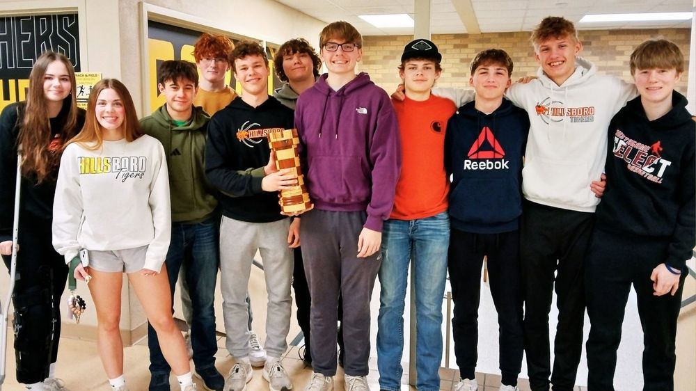 Hillsboro students pose with chess trophy