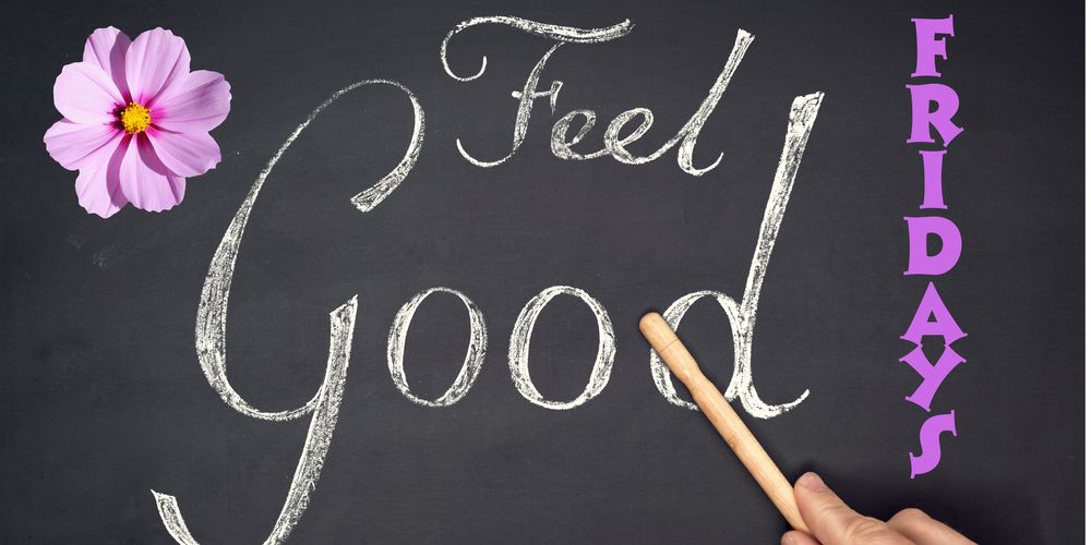 Feel Good Friday written on chalkboard with flower