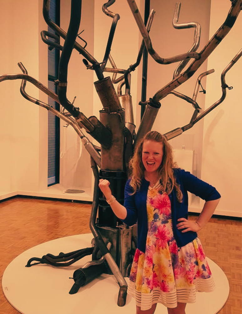 Danielle Bender poses with sculpture
