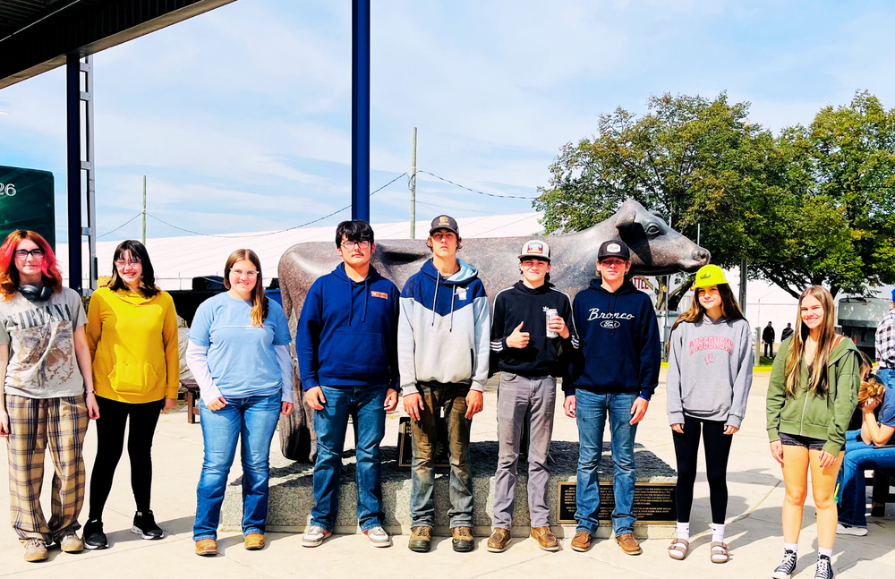 Students pose at the World Dairy Expo
