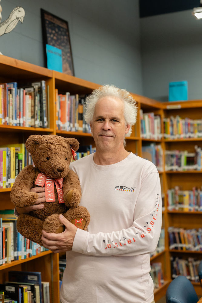 Michael Scheder poses with stuffed bear
