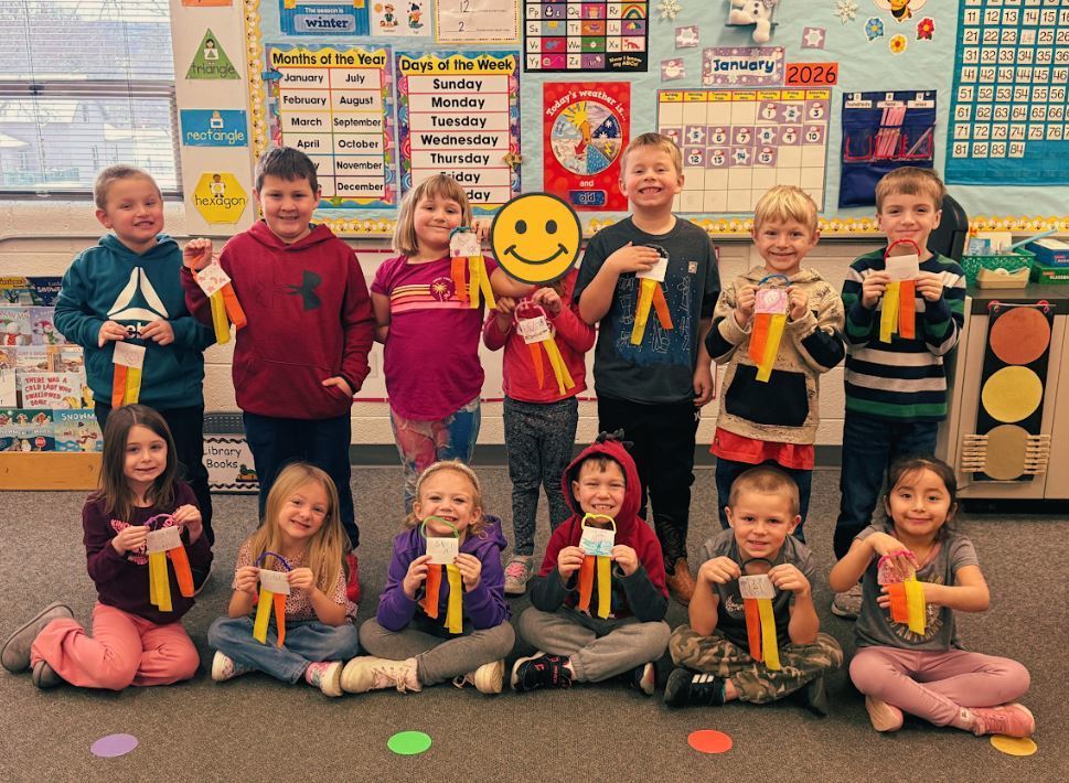 Kindergarten students pose with their Breeze Buddies