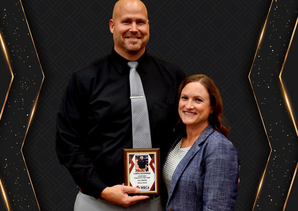 Chris Koopman and Sarah receive award