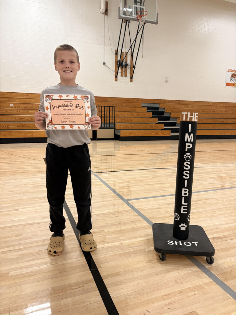 Soren poses with his award