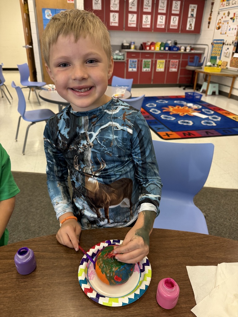 Students paint pumpkins