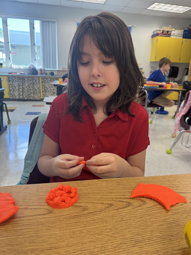 students using playdoh for learning