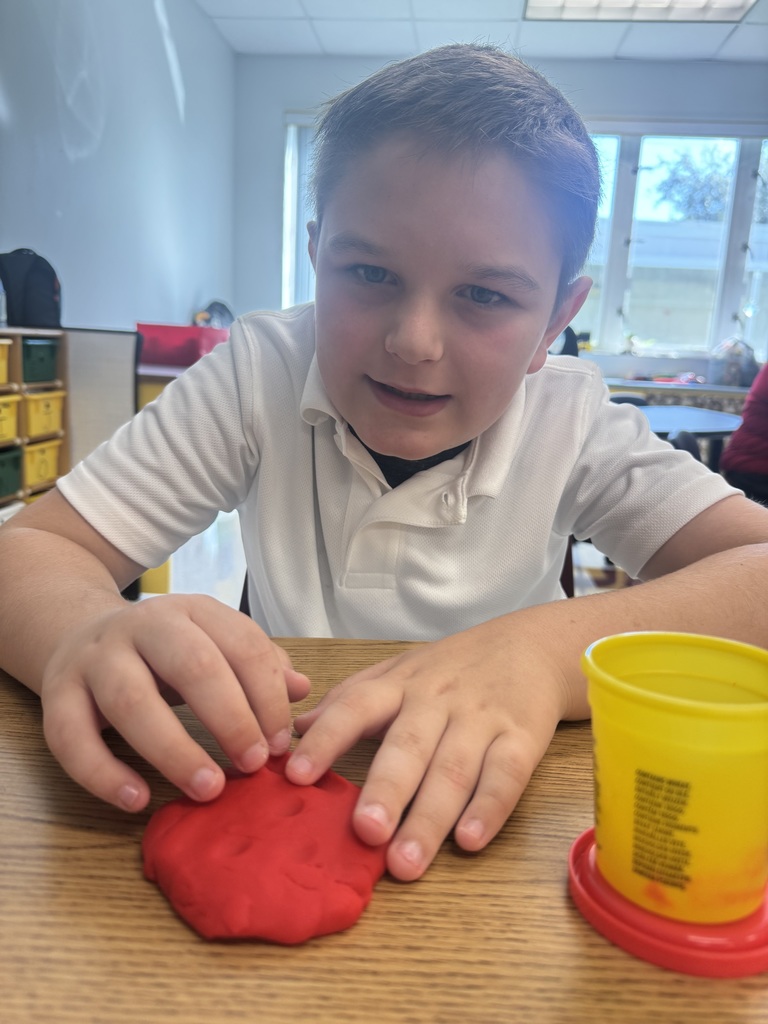 students using playdoh for learning
