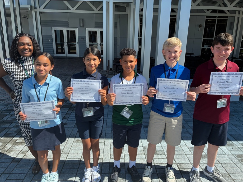 Students holding awards