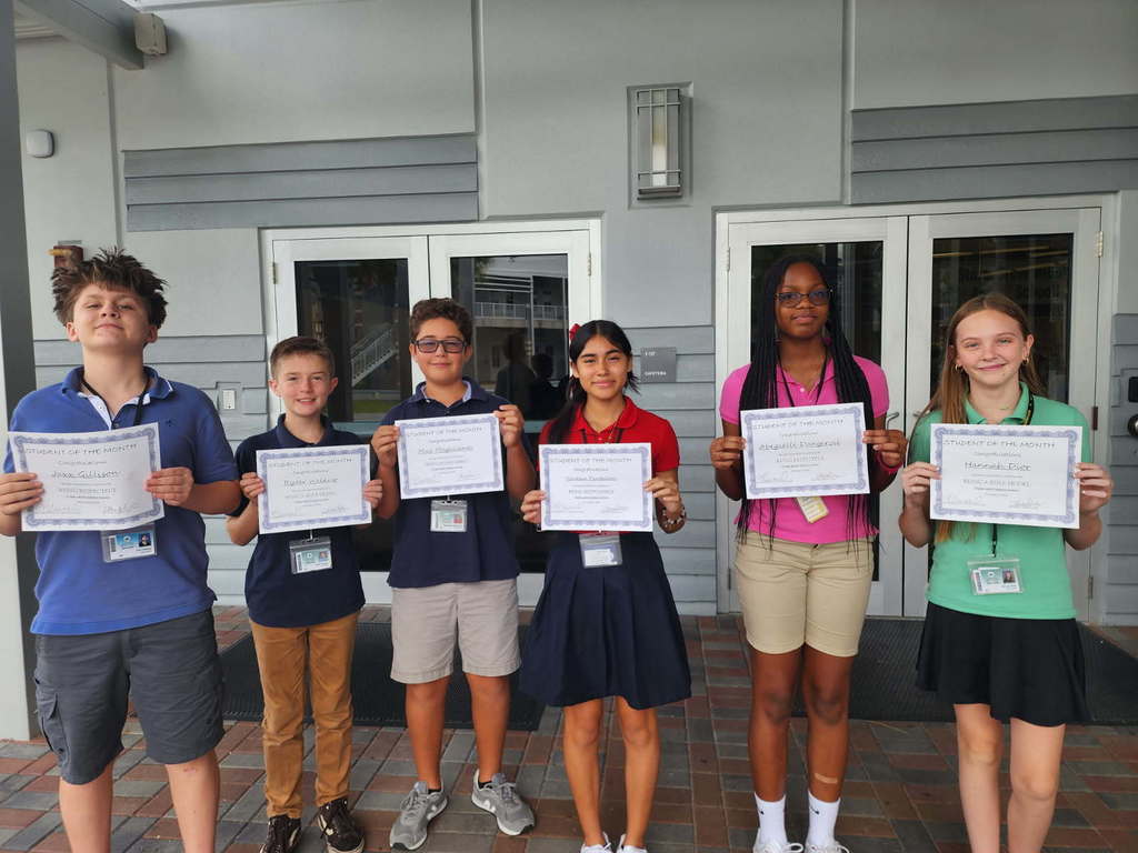 Students holding awards
