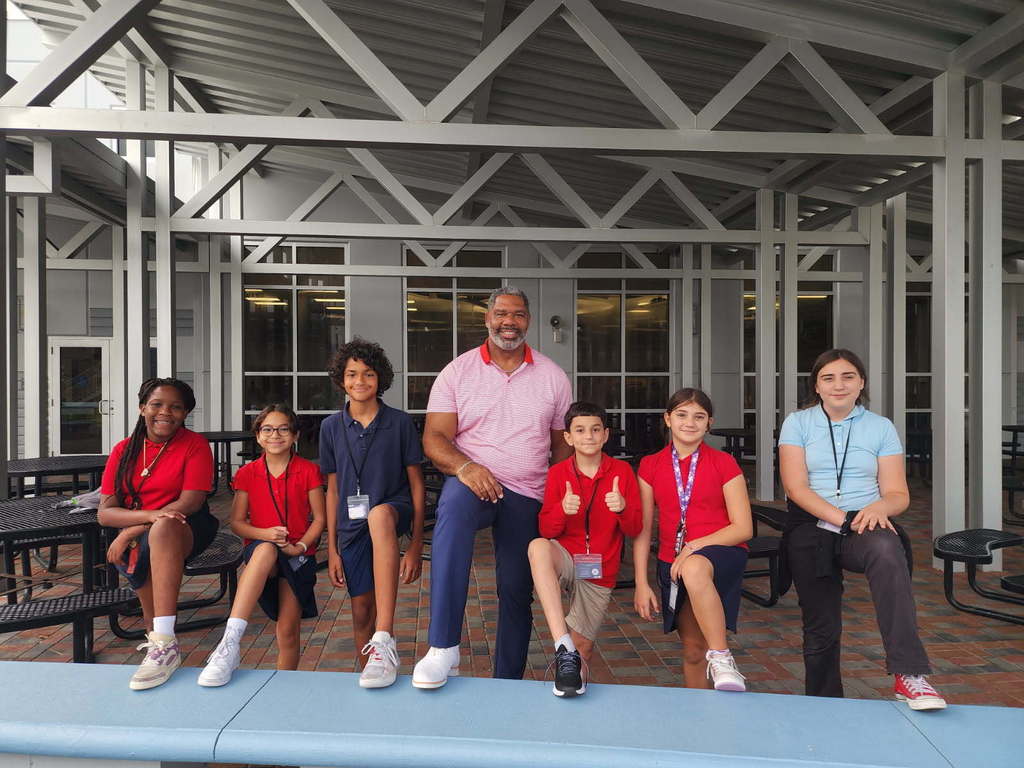 Students wearing red, white and blue