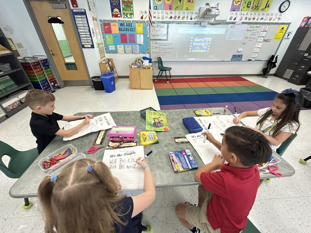 Students working on by reading the book We the Kids by David Catrow and created our own preamble.