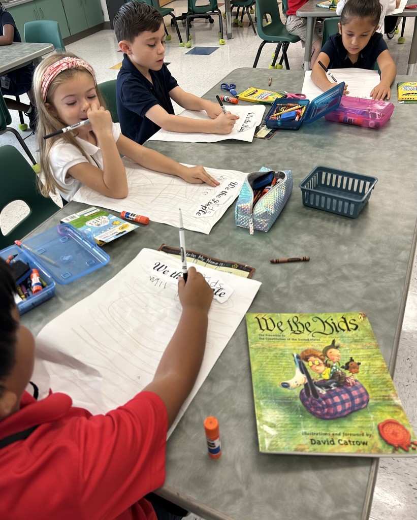 Students working on by reading the book We the Kids by David Catrow and created our own preamble.