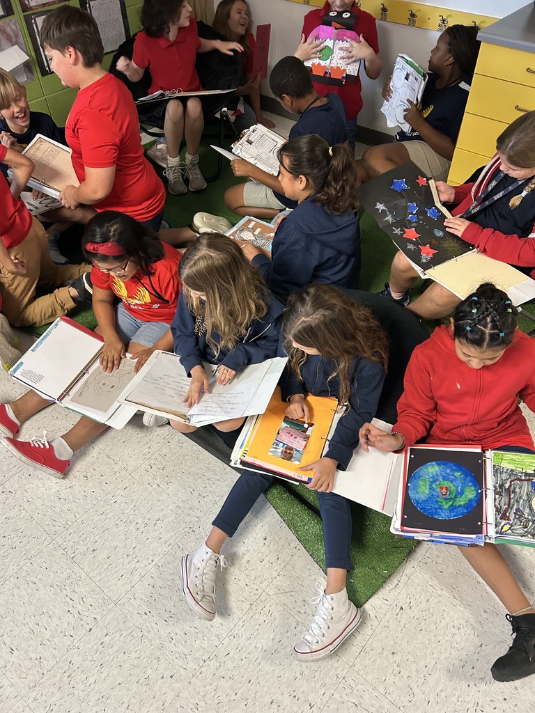 5th grade students in Mrs. Webber's class enjoyed looking at their IB Portfolio's dating all the way back to kindergarten!