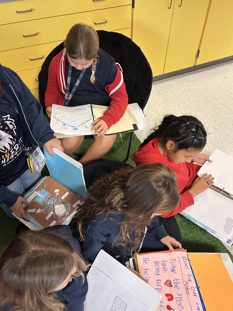 5th grade students in Mrs. Webber's class enjoyed looking at their IB Portfolio's dating all the way back to kindergarten!
