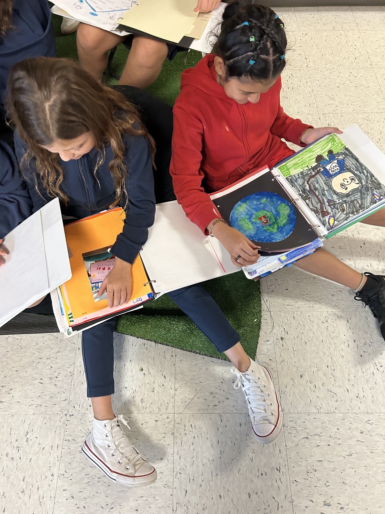 5th grade students in Mrs. Webber's class enjoyed looking at their IB Portfolio's dating all the way back to kindergarten!