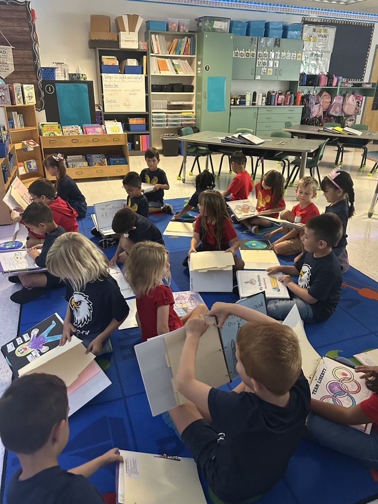 First grade looking at IB portfolios for IB portfolio exchange day!!